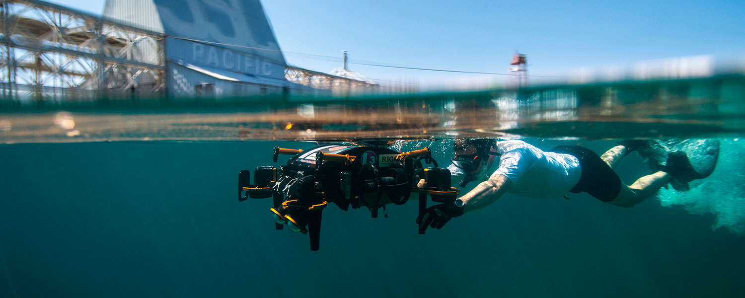 Picture of San Diego City Community College student testing underwater technology at the Transducer Evaluation Center
